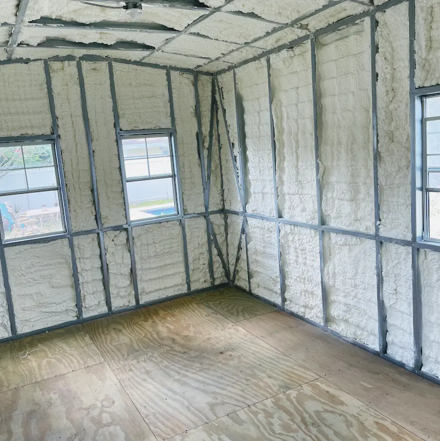 Closed-cell spray foam insulation applied to wall cavities in a residential project in Mound